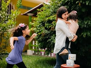 A mom with her daughters and Re-Lyte Immunity for clean, no-sugar hydration and immune support.